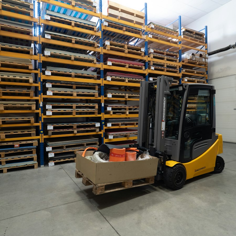Forklift moving pallets in a 3PL warehouse