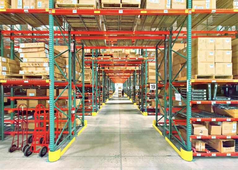 3PL warehouse aisle with racks of boxed inventory
