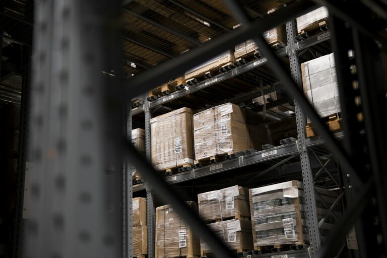 Secure warehouse racks holding boxed imported goods