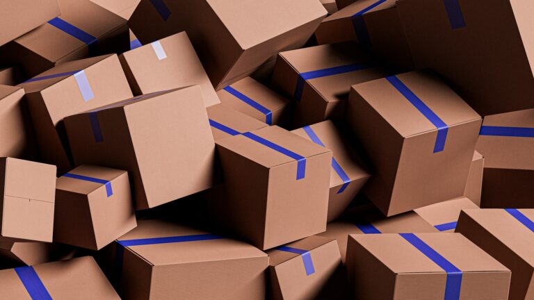 Pile of taped cardboard boxes ready for ecommerce shipping