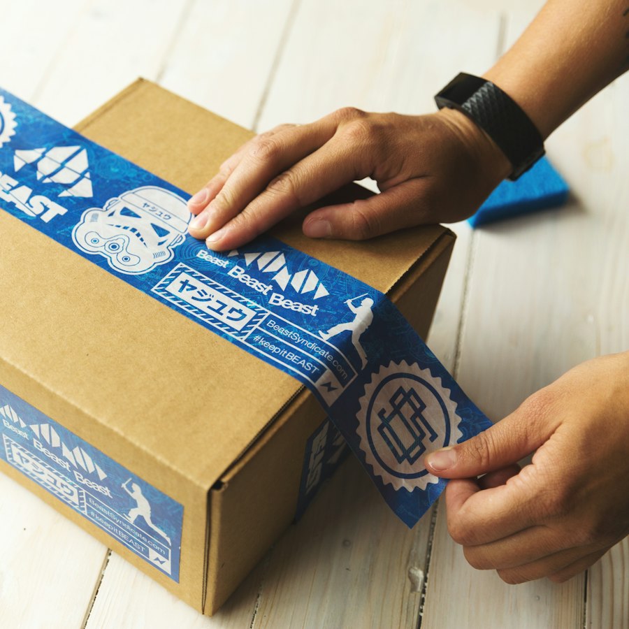 Packing and taping an ecommerce order box