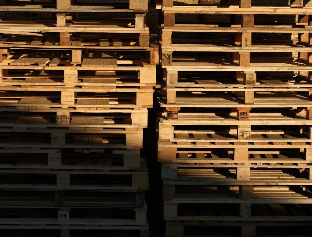 Stacked wooden pallets ready for reuse and recycling